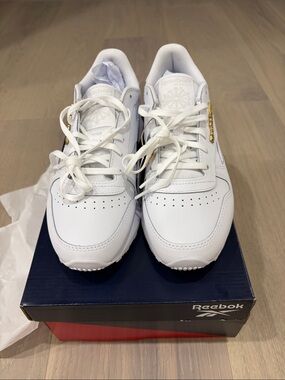 Reebok White Leather Athletic Sneakers with Gold Accent